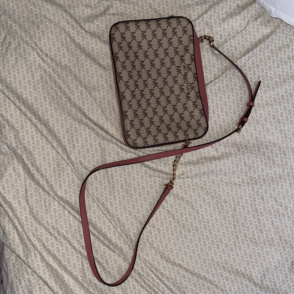 Lightly used Michael Kors logo crossbody pink